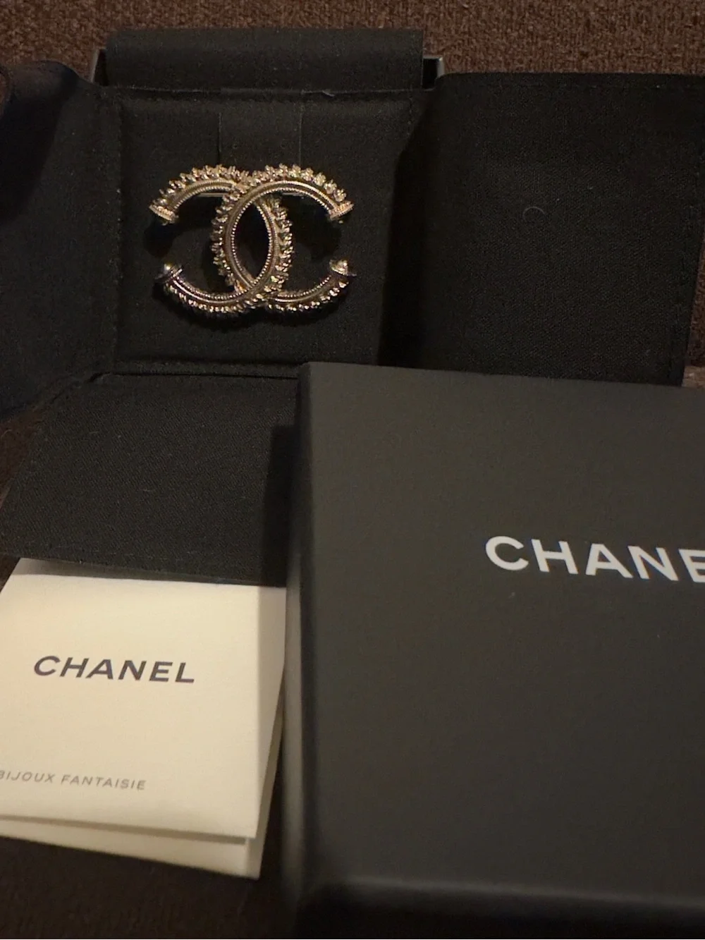 LIKE NEW Chanel Gold Double-C Logo Brooch in gold tone. Box and card included.